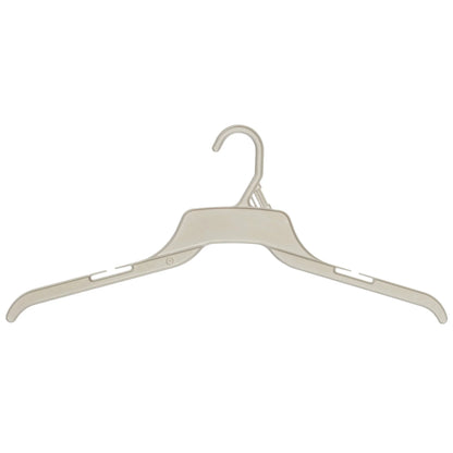 Beige plastic clothes hanger with notches and wide shoulders on white background