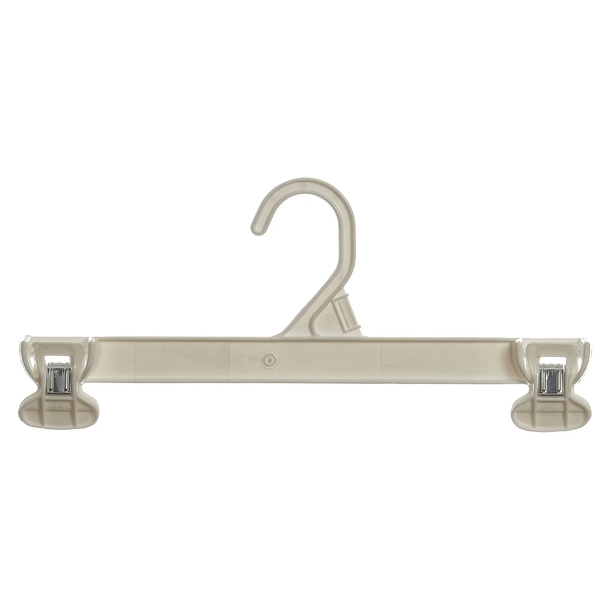 Beige plastic clothes hanger with adjustable pant clips, isolated on white background