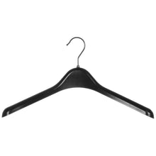 Black plastic clothes hanger with metal hook on white background